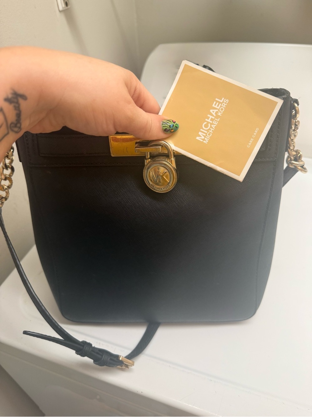 Michael Kors Black Crossbody Bag with Gold Accent Lock